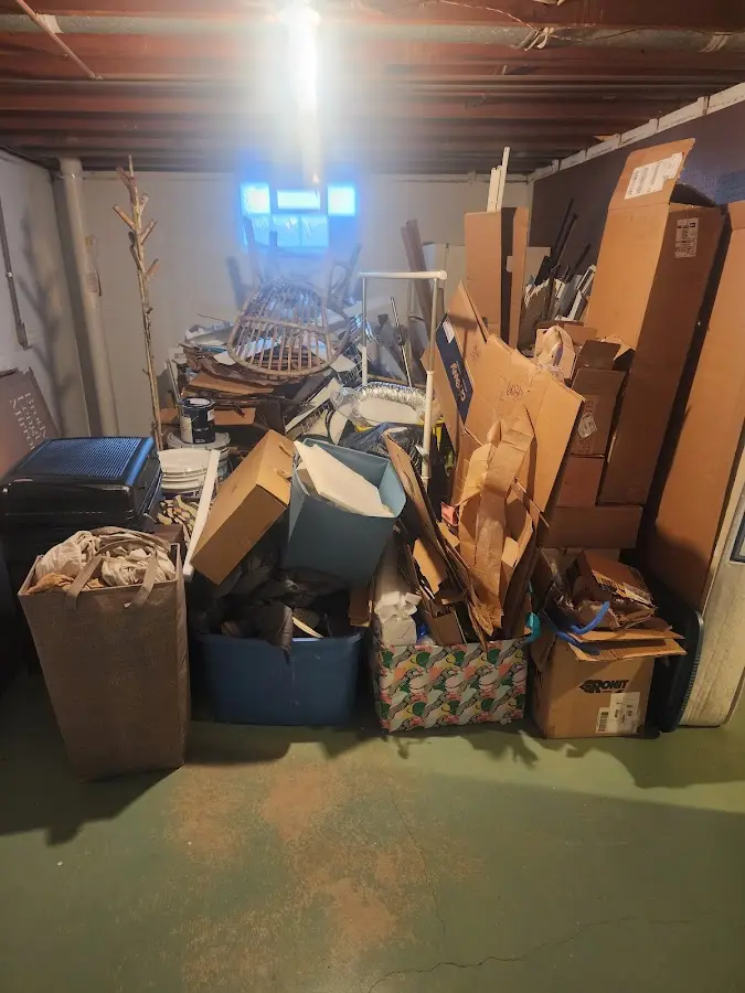 Roll-off dumpster container at job site for 6 Yard Dumpster Rental in Lamont